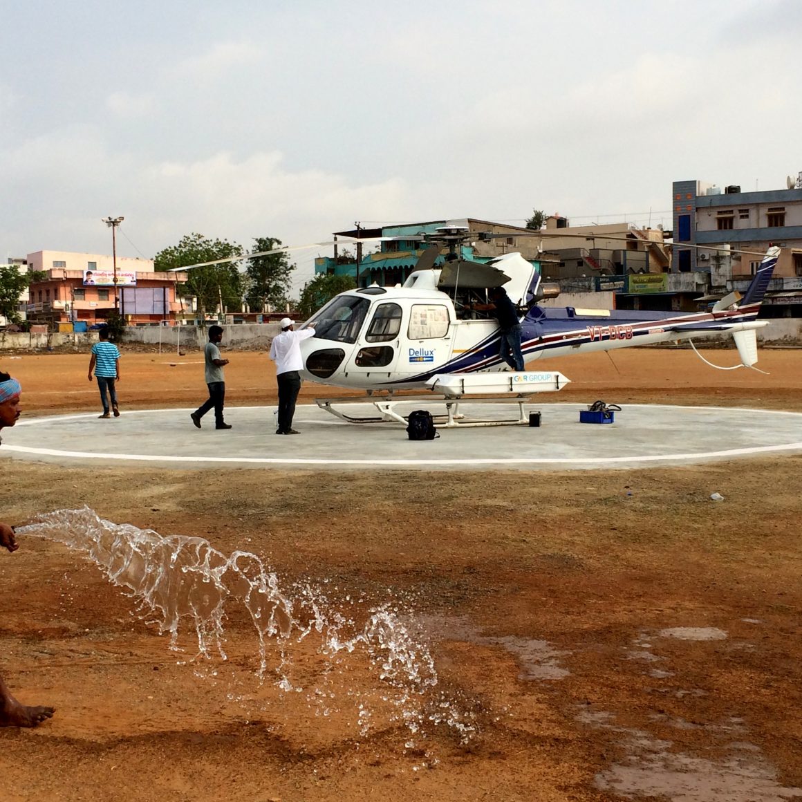 watering heli pad before take off